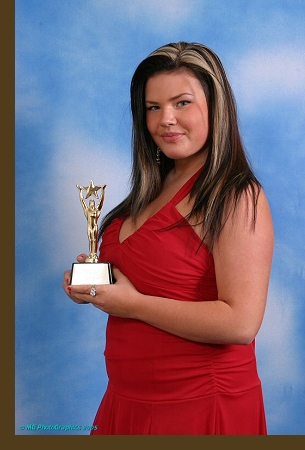 Christina at the 26th Annual Young Artist Awards, holding her award for ''Best Performance in a TV Series (Comedy or Drama) - Supporting Young Actress.'' Click the image to view it at a larger size